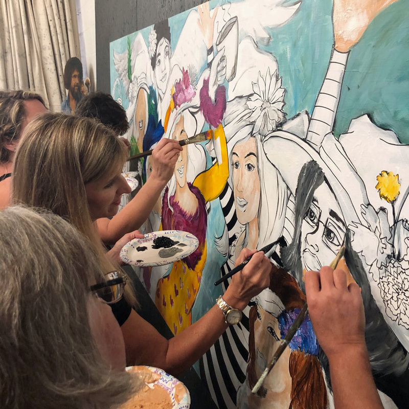 A guest at a Thomas Andrew Art private paint party finishing her canvas — Birmingham, AL