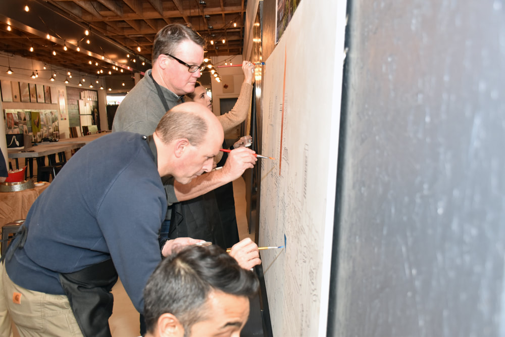Mural team-building event at Thomas Andrew Art studio.