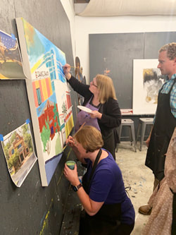 Team mural painting session at Thomas Andrew Art studio.