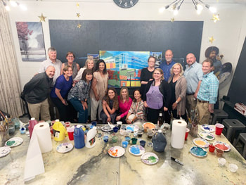 Group mural event participants at Thomas Andrew Art.