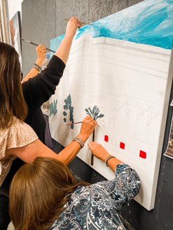 Mural team-building activity at Thomas Andrew Art Homewood studio.