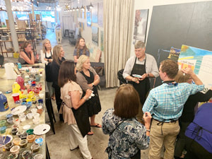 Mural team-building participants at Thomas Andrew Art studio.